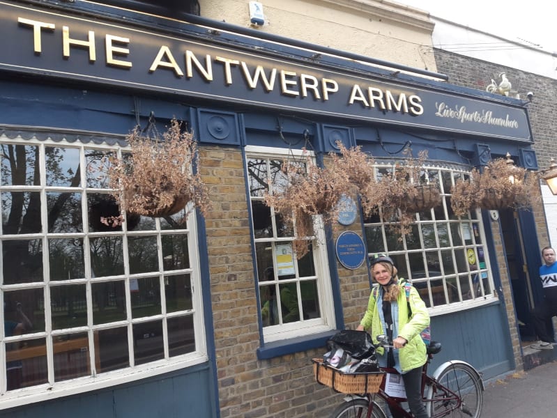 Cyclist arriving at the Antwerp Arms to collect food for delivery