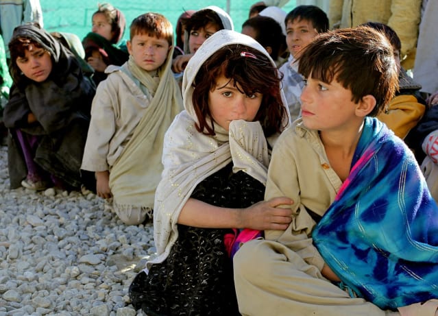 A group of Afghan children sitting together